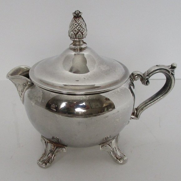 vintage silver covered creamer